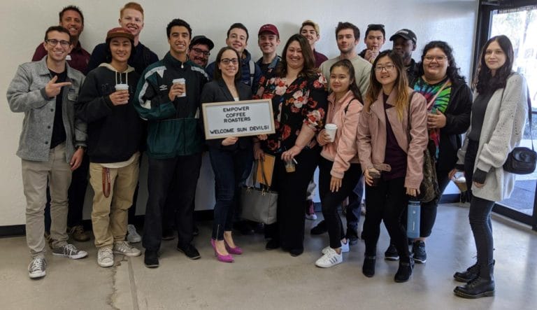 Group of 18 ASU students visiting a startup, Empower Coffee Roasters