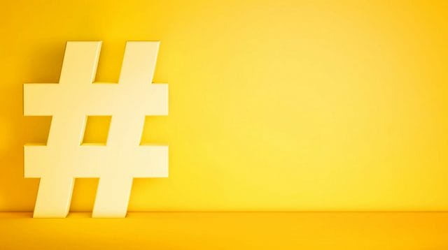 yellow wall with a hashtag symbol 