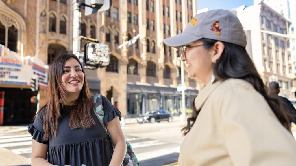 Two people walking in downtown Los Angeles