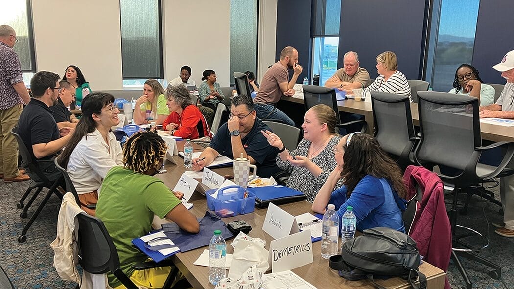 A group of people collaborating at a coworking space.